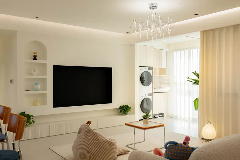 Bright and elegant minimalist living room with modern decor and natural light.