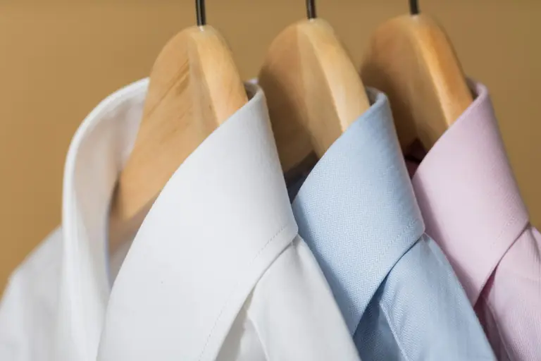 white and purple button up shirt