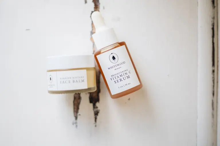 Flatlay of natural skincare products, emphasizing clean beauty and minimalist design.
